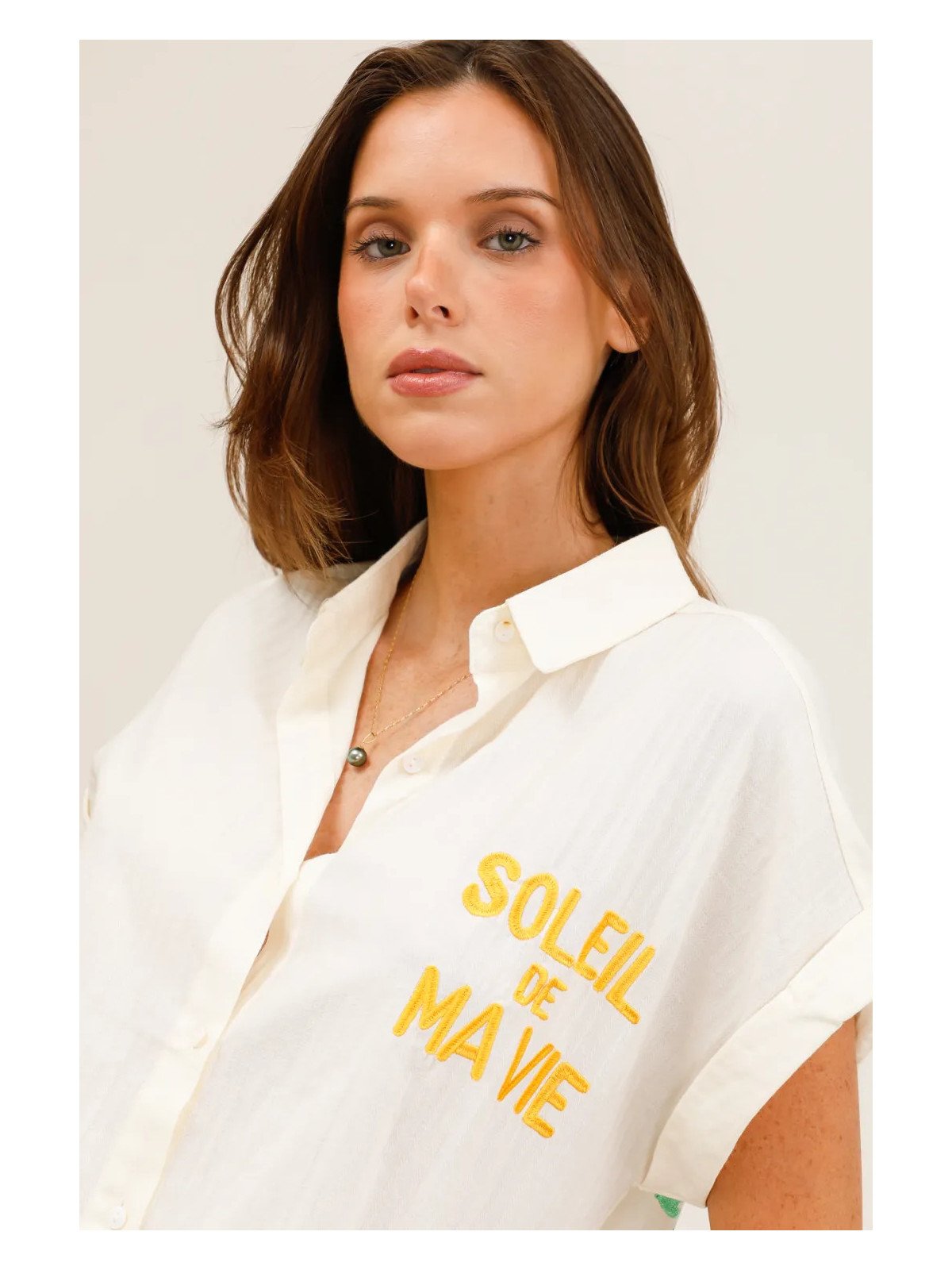 Flowy short-sleeved shirt with embroidered details