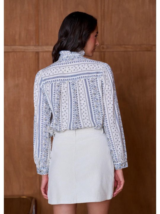 Women's blouse with a high, ruffled collar