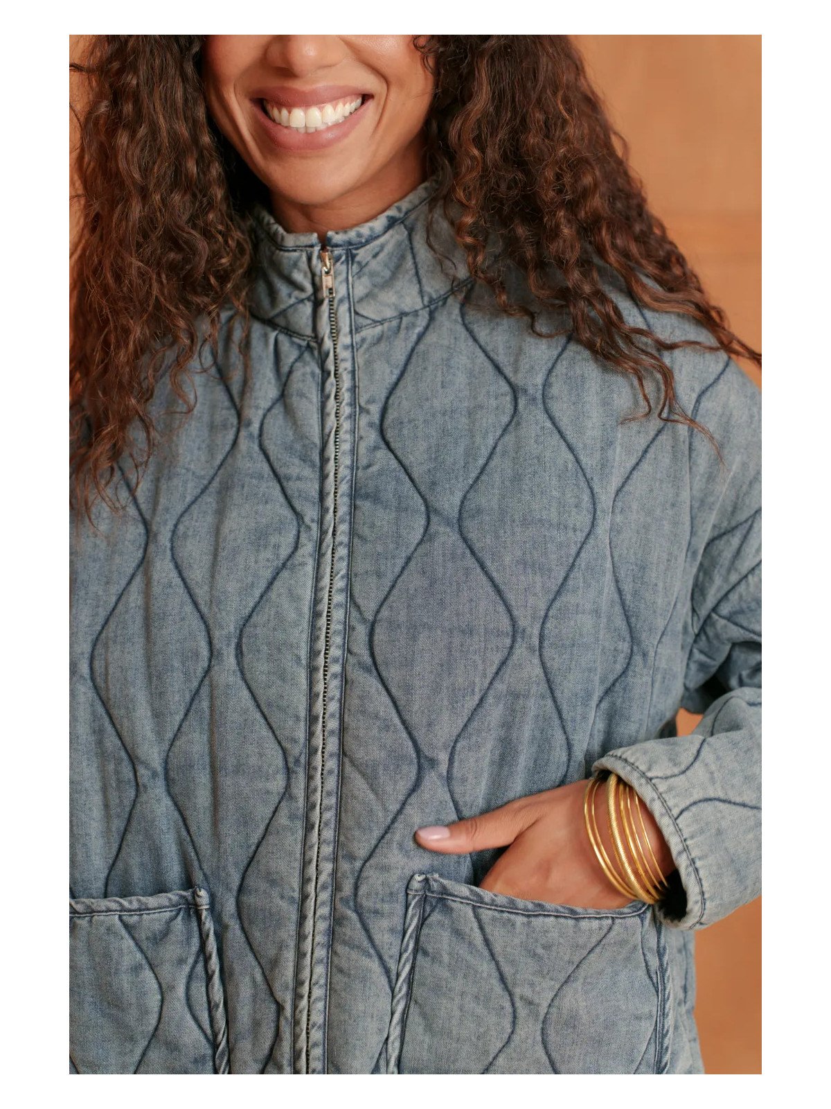 Women's quilted denim jacket with a stand-up collar