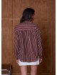 Women's loose-fitting blouse with a gathered collar and long sleeves