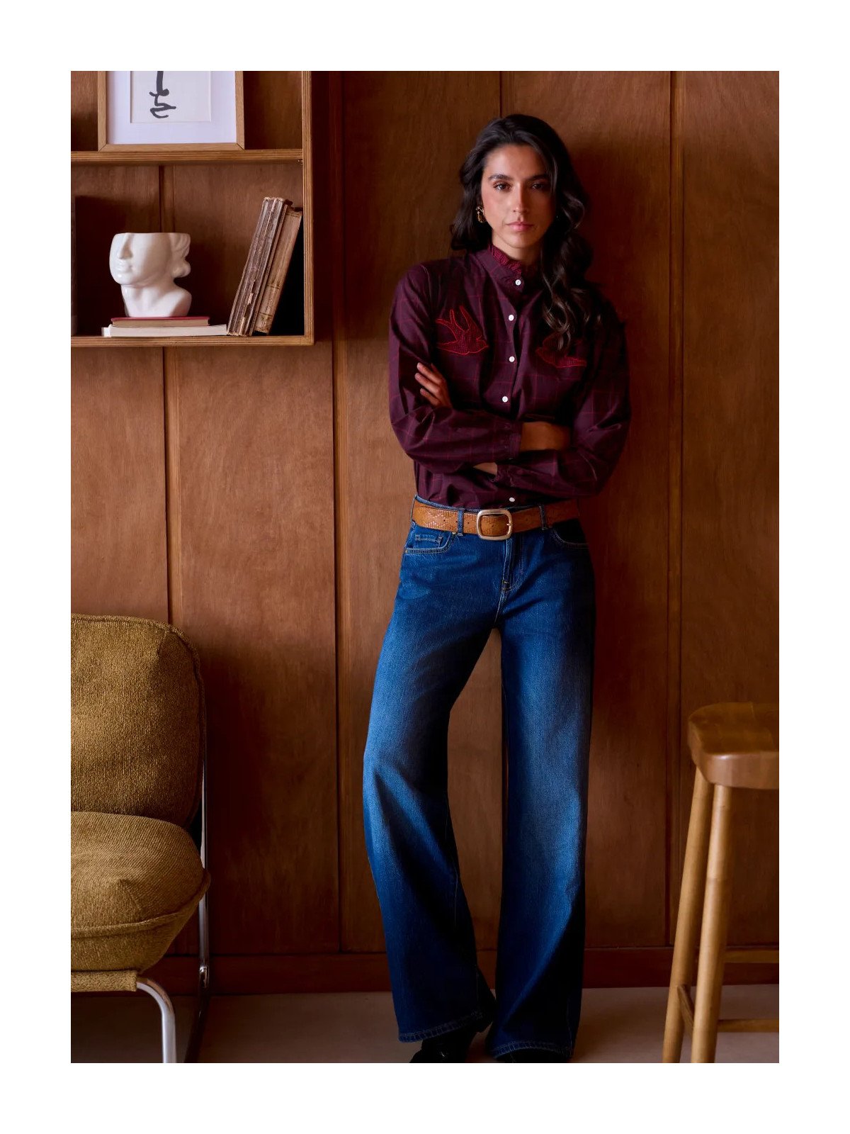 Women's loose-fitting blouse with a gathered neckline and appliqué details